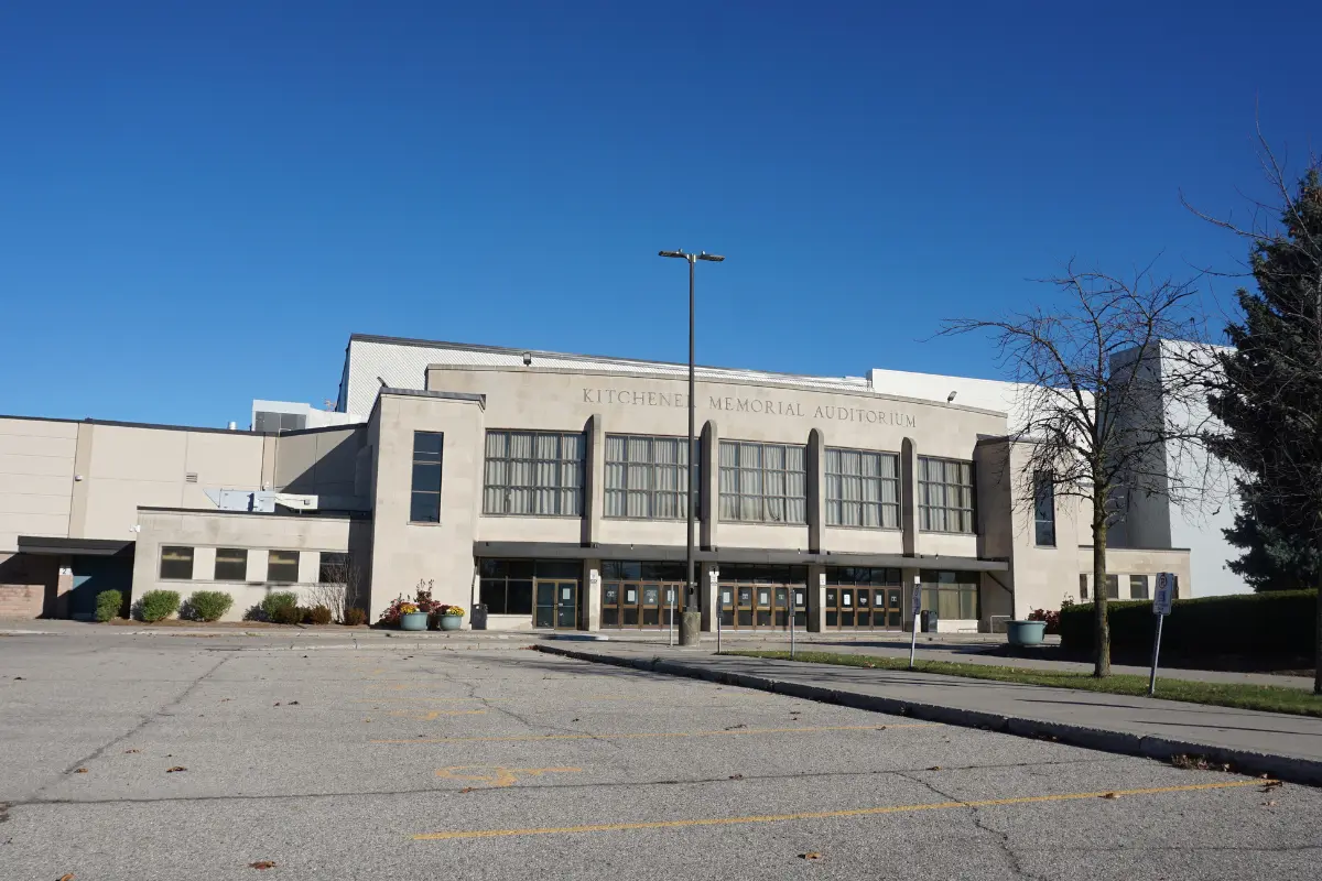 Kitchener Memorial-Auditorium Complex font building design with blue clear sky behind