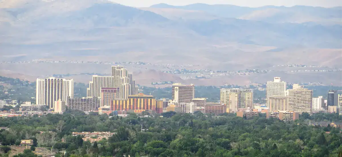Reno city view with hills and mountains in the background.